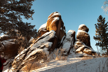 rocks covered with snow in winter, Stolby National Park, Krasnoyarsk