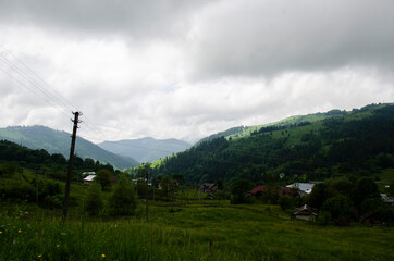 Beautiful landscape with the top of the mountains in the fog.