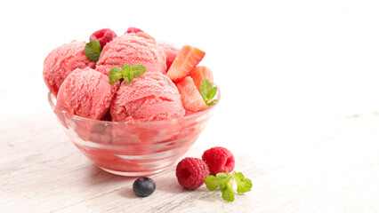 strawberry ice cream scoop in bowl