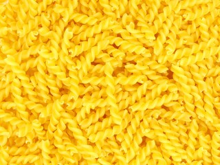 Pile of raw italian fusilli pasta for cooking