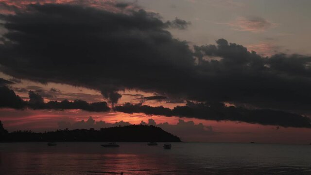 Time lapse of sunset from Banrak Beach at Koh Samui island in Thailand 4 k