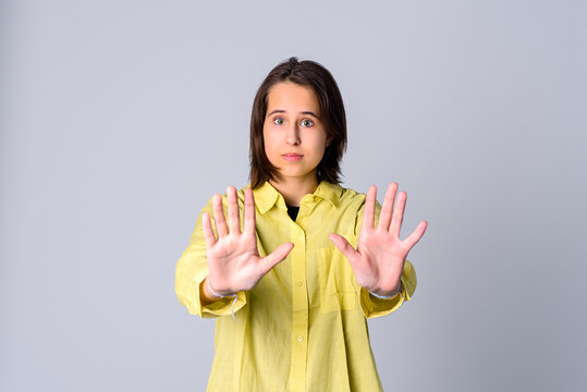 Stop. Serious Teen Girl Show Stop Prohibit Gesture Both Hands, Keep Your Distance, Stay Away Back Off Sign