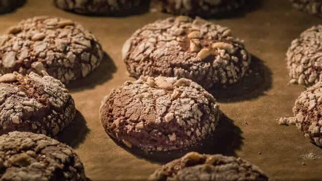 Close up of chocolate cookies baking in the oven on high temperature. Christmas treat for Santa Claus