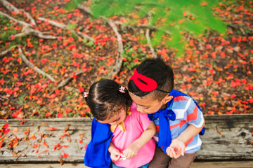 Cute brother and sister playing together