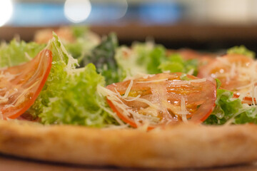 Close-up view of the side of Italian pizza
