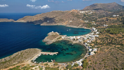 Aerial drone photo of beautiful twin bay, beach and small village of Kapsali  below iconic castle of Kythera island, Ionian, Greece