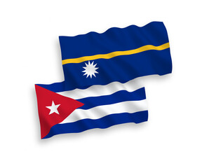 National vector fabric wave flags of Republic of Nauru and Cuba isolated on white background. 1 to 2 proportion.