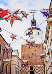Christmas Decorations in front of the Cracow Gate, Old Town, winter, Lublin, Lublin Voivodeship, Poland - obrazy, fototapety, plakaty
