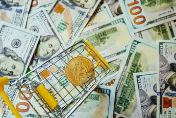 Bitcoin vs Dollars Shopping Cart Background of Hundreds of Dollars Green Yellow.