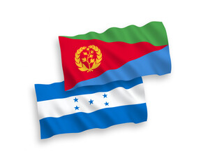 National vector fabric wave flags of Eritrea and Honduras isolated on white background. 1 to 2 proportion.