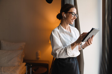 Smiling middle aged brunette white businesswoman