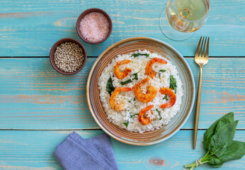 Risotto with shrimps and spinach. Healthy food. Vegetarian food.