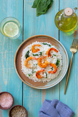 Risotto with shrimps and spinach. Healthy food. Vegetarian food.