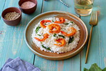 Risotto with shrimps and spinach. Healthy food. Vegetarian food.