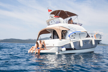 group of young people enjoying a yacht at  holiday in the sea - 440958057