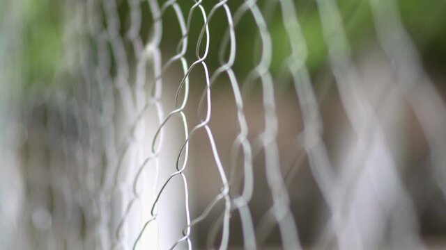 Wire safety fence of a prison, closeup