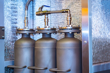 Water purification system. Fragment of a system for water purification close-up. Identical balloons...