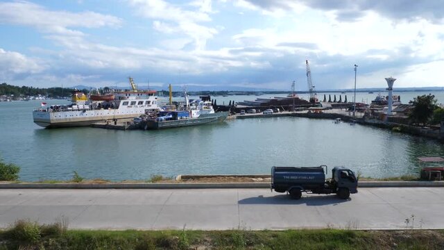 Kendari, southeast sulawesi, Indonesia- january 10, 2021: ship leaning on the beach in the harbor