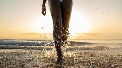 Black woman with braids on the beach