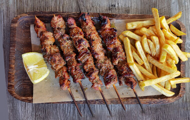 souvlaki potatoes lemon meat roasted traditional in greece
