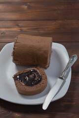 Slice of cake garnished with chocolate
