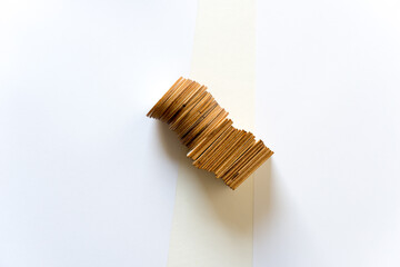 round and square wooden shapes on paper