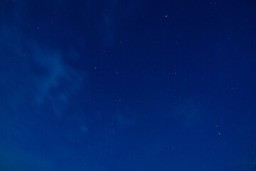 night blue sky with haze and stars.