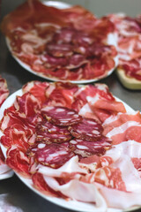 Cold dish of Parma ham, salami and lard