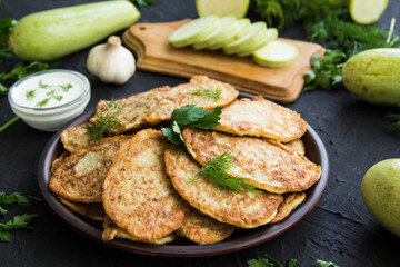 A healthy breakfast of zucchini pancakes. Creative atmospheric decoration