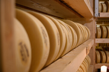 swiss cheese storage in Gstaadt - obrazy, fototapety, plakaty