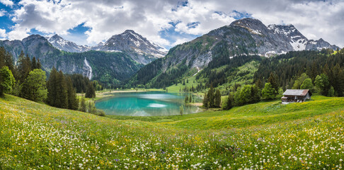 idyllic Lake Lauenensee with Wildhorn in spring, Bernese Alps, Switzerland