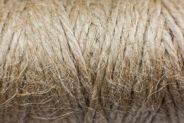 Thread background texture..Brown string. Rope lace. Macro photo, close up.