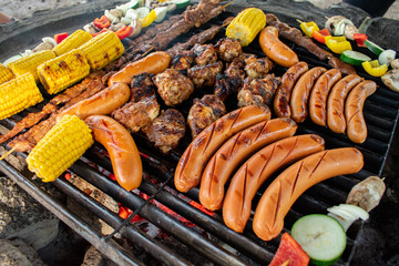 Sausage, Meat and Vegetable Barbecue. Home-marinated and home-prepared pork, chicken, and vegetable...