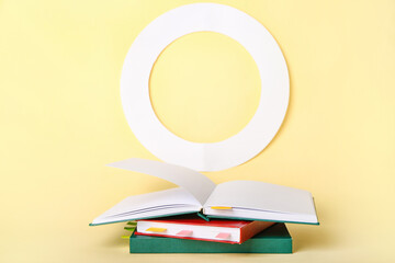 Books with bookmarks on color background