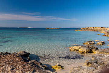 High angle shot of the beach with transparent water in the island of Formentera in Spain