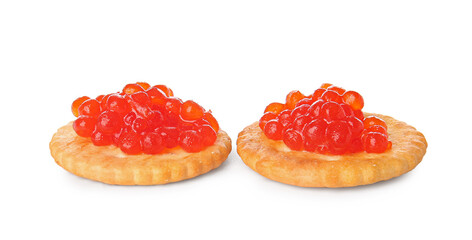 Tasty crackers with red caviar on white background
