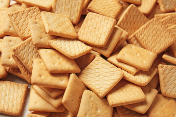 Tasty crackers as background, closeup