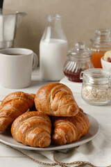 breakfast with croissant and coffee