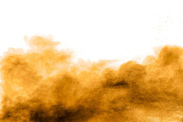 Freeze motion of brown dust explosion on white background.Stopping the movement of brown Holi powder.