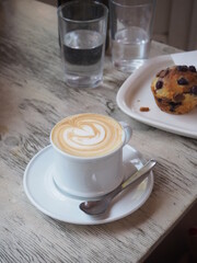 Flat white and muffin