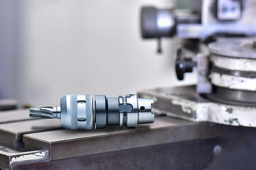 Fototapeta na wymiar cutting tools special reamer in holder material Carbide-k10 coat Titanium nitride. On machine grinding.