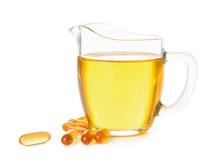 Jug of fish oil and capsules on white background