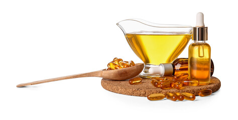 Gravy-boat and bottles with fish oil and capsules on white background