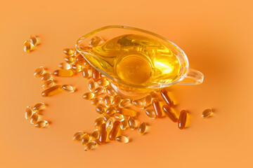 Gravy-boat of fish oil and capsules on color background