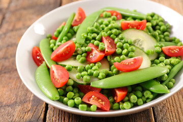vegetable salad with pea,  bean, cucumber and tomato