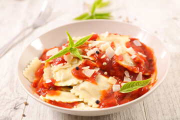 raviolis with tomato sauce and basil