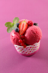 bowl of delicious ice cream and berries fruits
