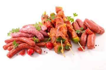 meats for barbecue- sausage, chorizo and skewer isolated on white background