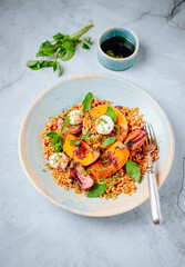 Squash, labneh, red onion & bulgur salad