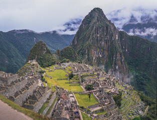 Famous view point of Machu Picchu lost city and Huayna Picchu mountain. Ruins of ancient inca civilization in the sacred valley of Cusco Province. Peru, South America